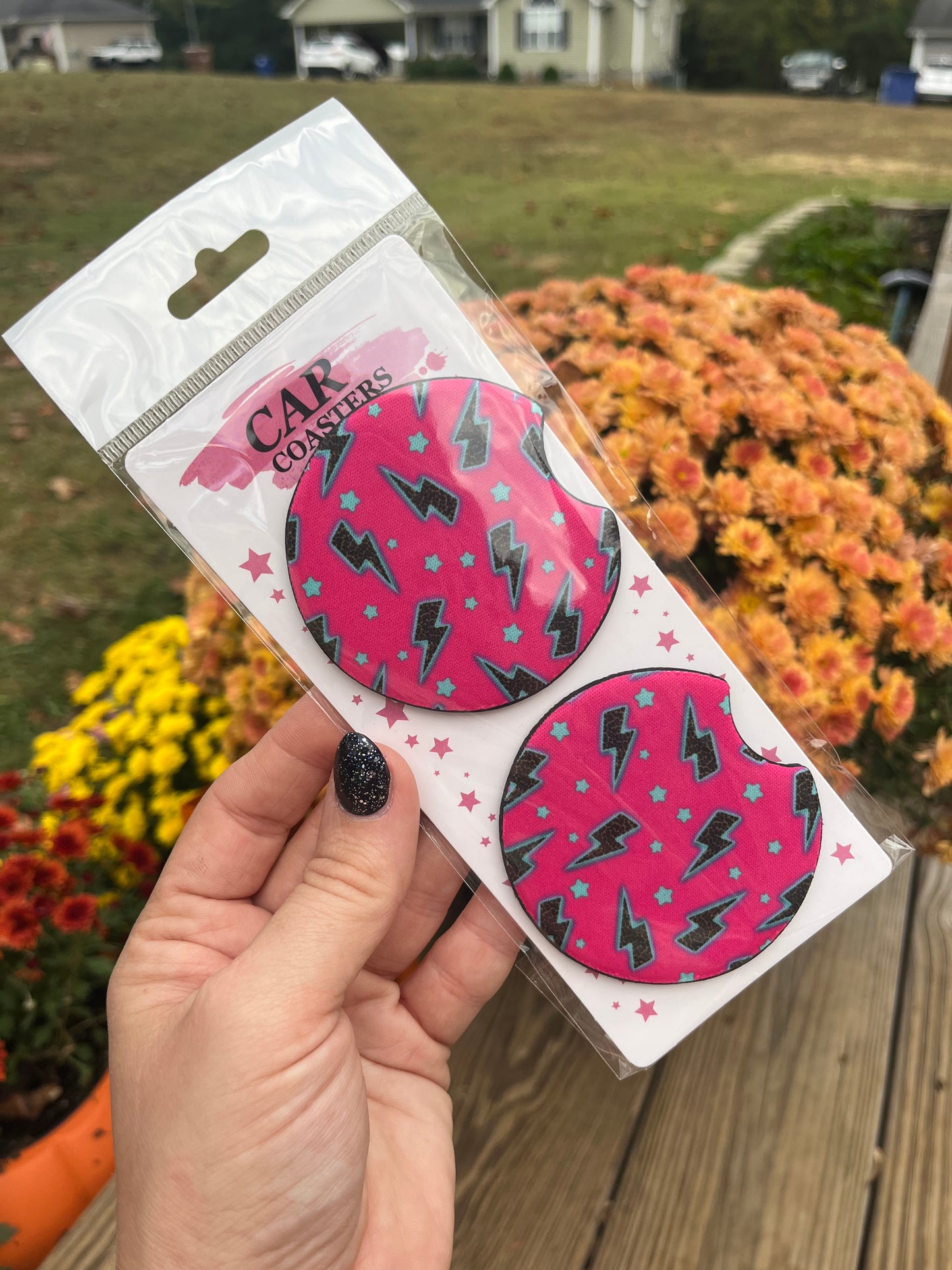 Neon pink and turquoise lightning car coasters