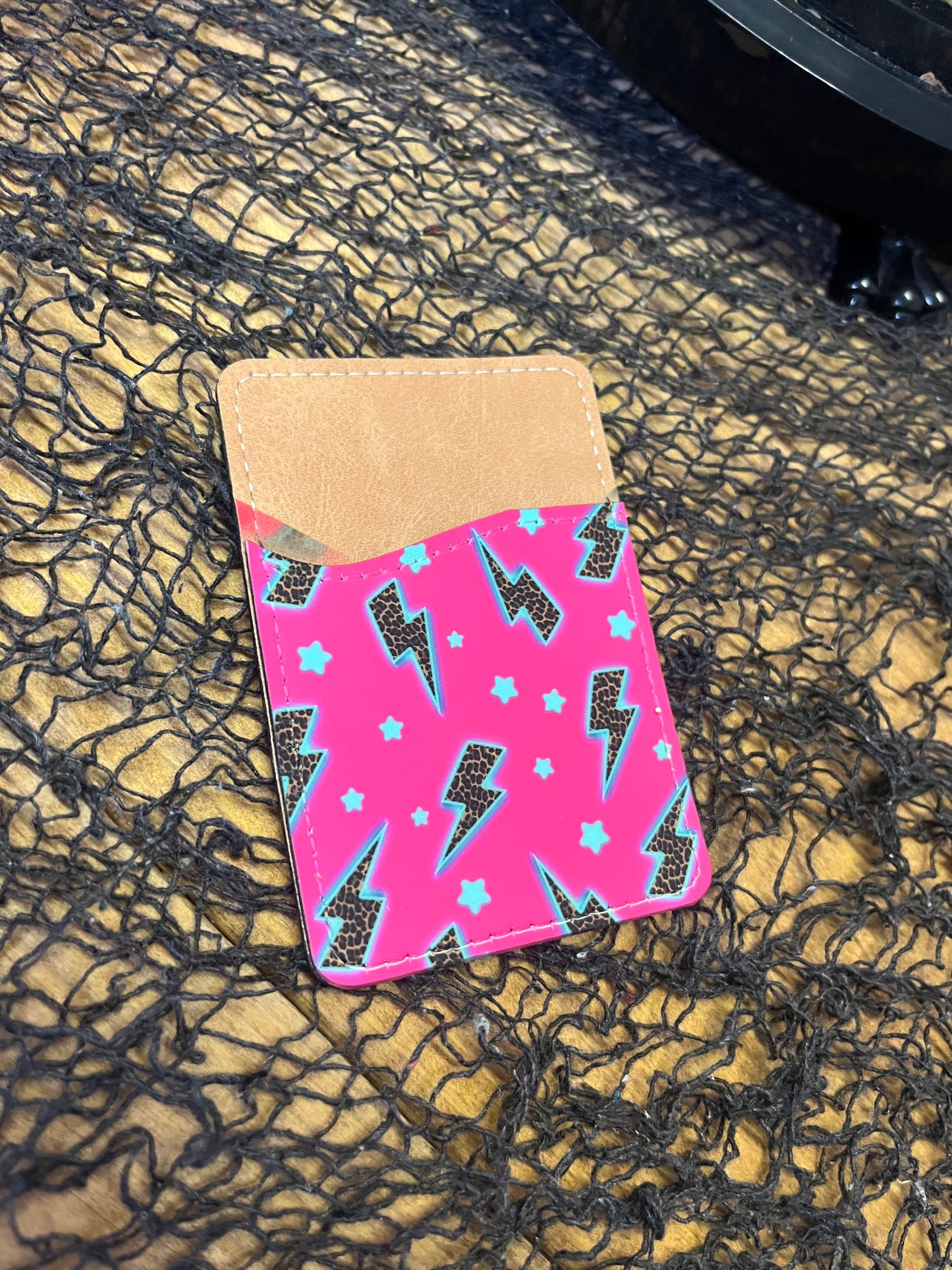 Slightly imperfect neon pink phone wallet