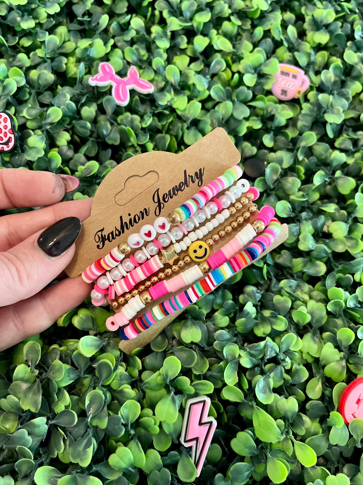 Pink beaded bracelet cluster (6)