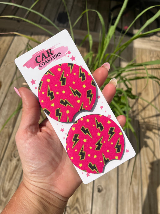 Neon pink and green lightning bolt car coasters