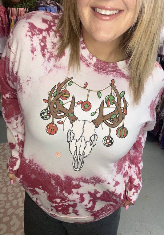 Antlers with red and green ornaments
