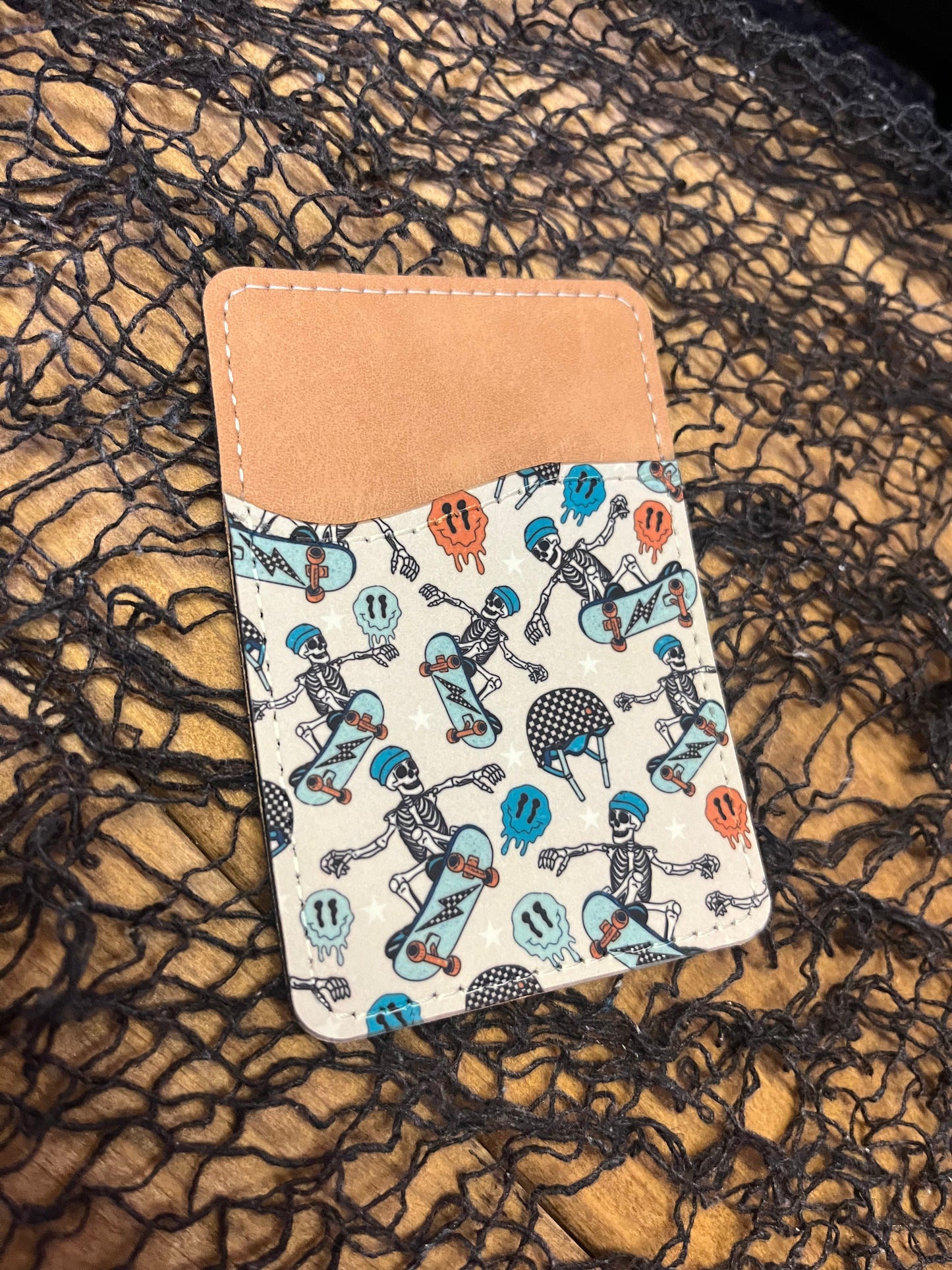 Skateboarding skeleton phone wallet