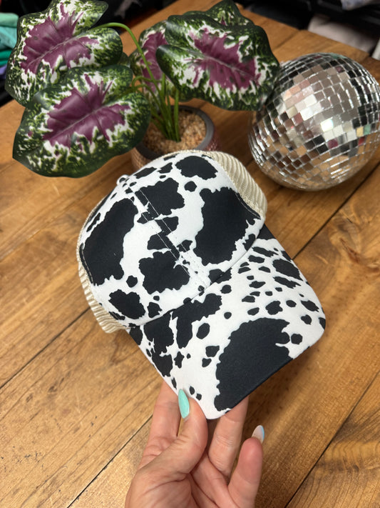 Cross cross cow print ponytail hat