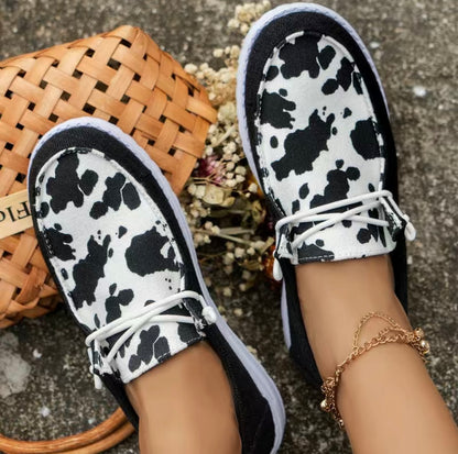 Cow print canvas slip on shoes